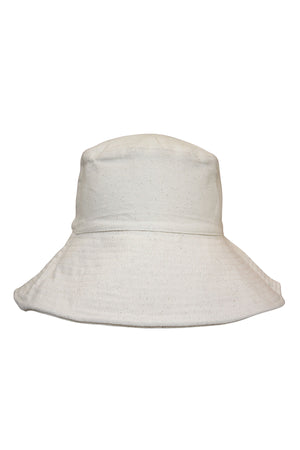 Discover the HAZEL CANVAS BUCKET HAT by Freya, a stylish plain white bucket hat featuring a wide brim and crafted with sustainable practices.