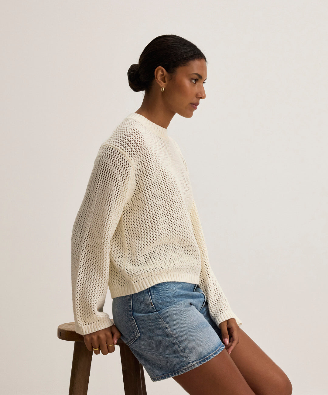 A woman wearing the Cotton Cashmere Kanan sweater in Milk by Velvet by Graham & Spencer.