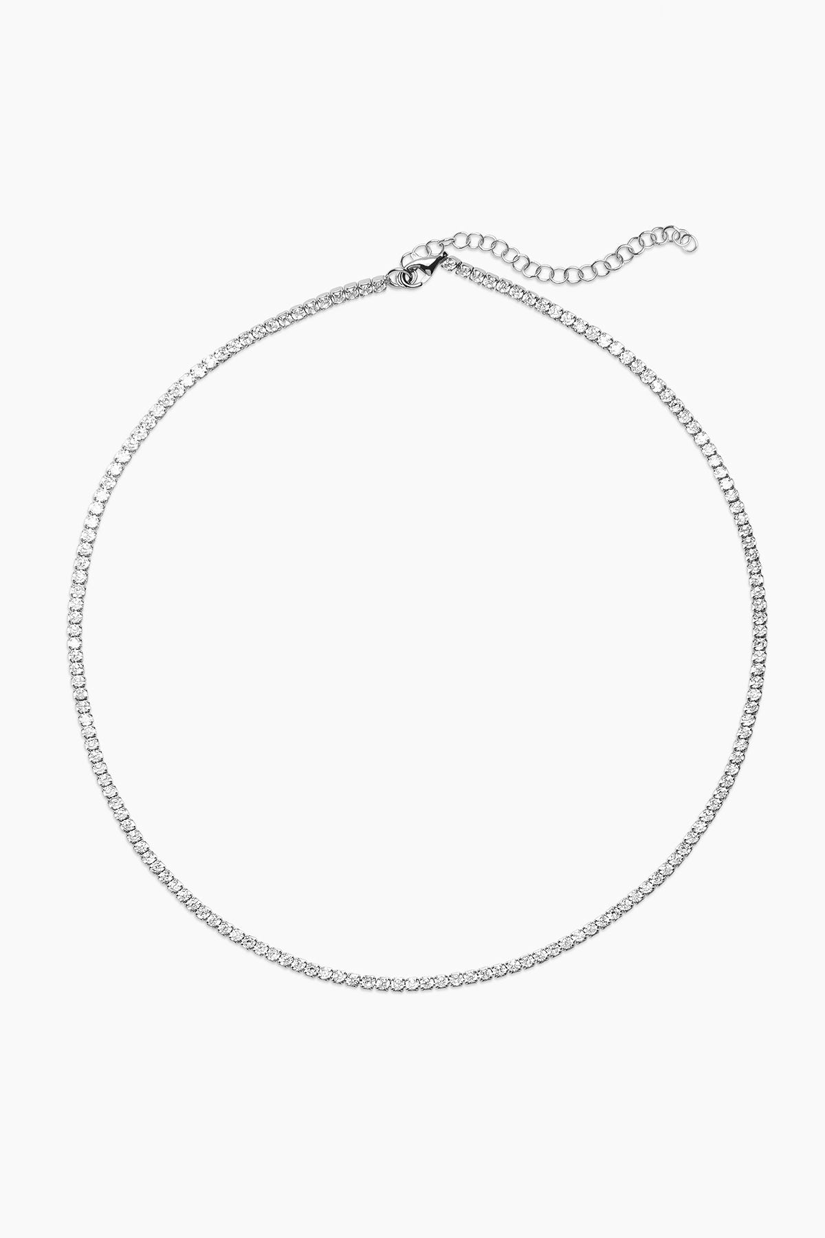 The GLIMMER NECKLACE BY PHYLLIS AND ROSIE features a simple chain design and an adjustable clasp, inspired by vintage street culture. This piece captures the essence of New York City jewelry with the elegance of Phyllis+Rosie.-37832862335169