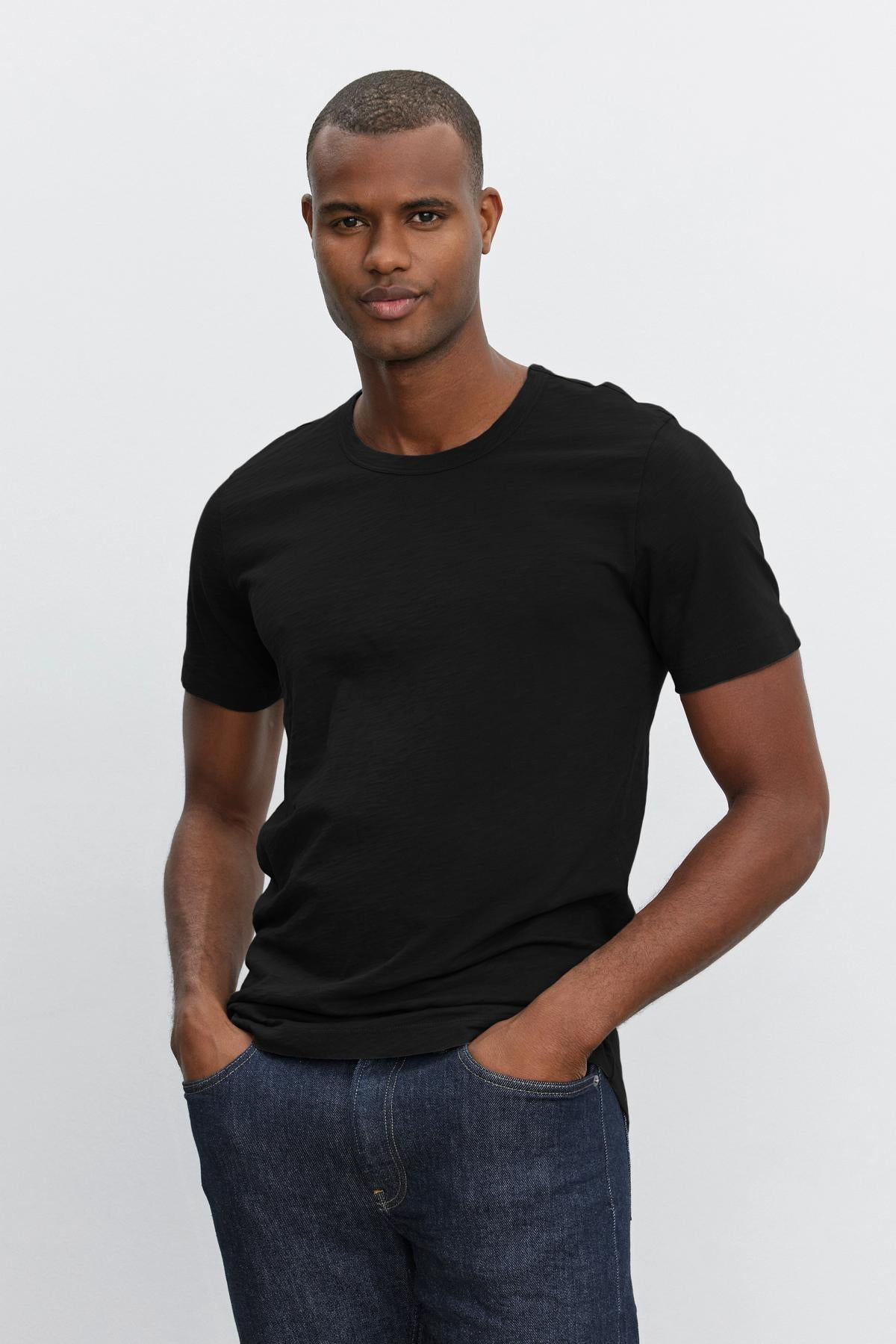 Man wearing a black Velvet by Graham & Spencer AMARO TEE posing for the camera.-36273922015425