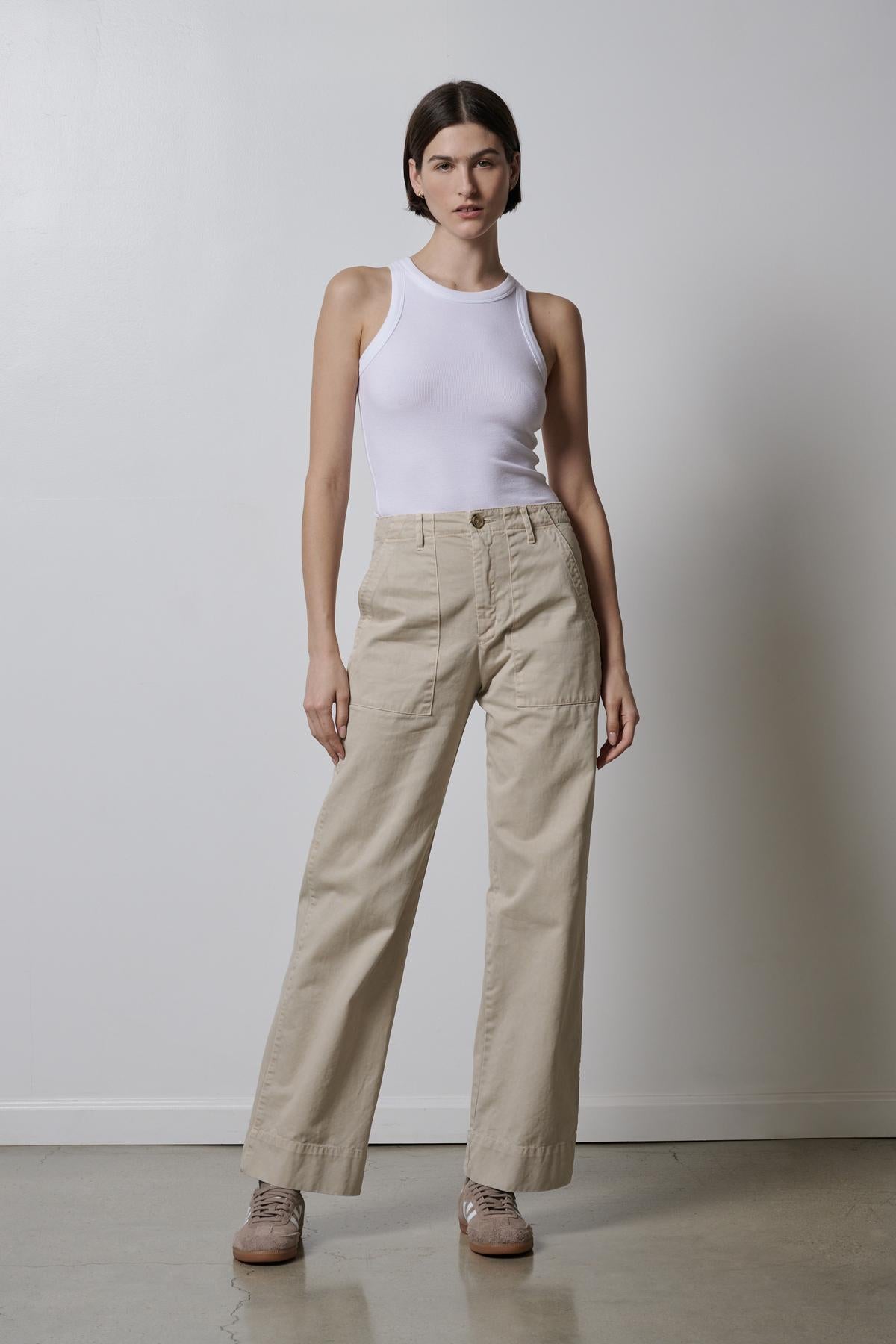   The model is wearing a white tank top and Velvet by Jenny Graham's VENTURA PANT. 