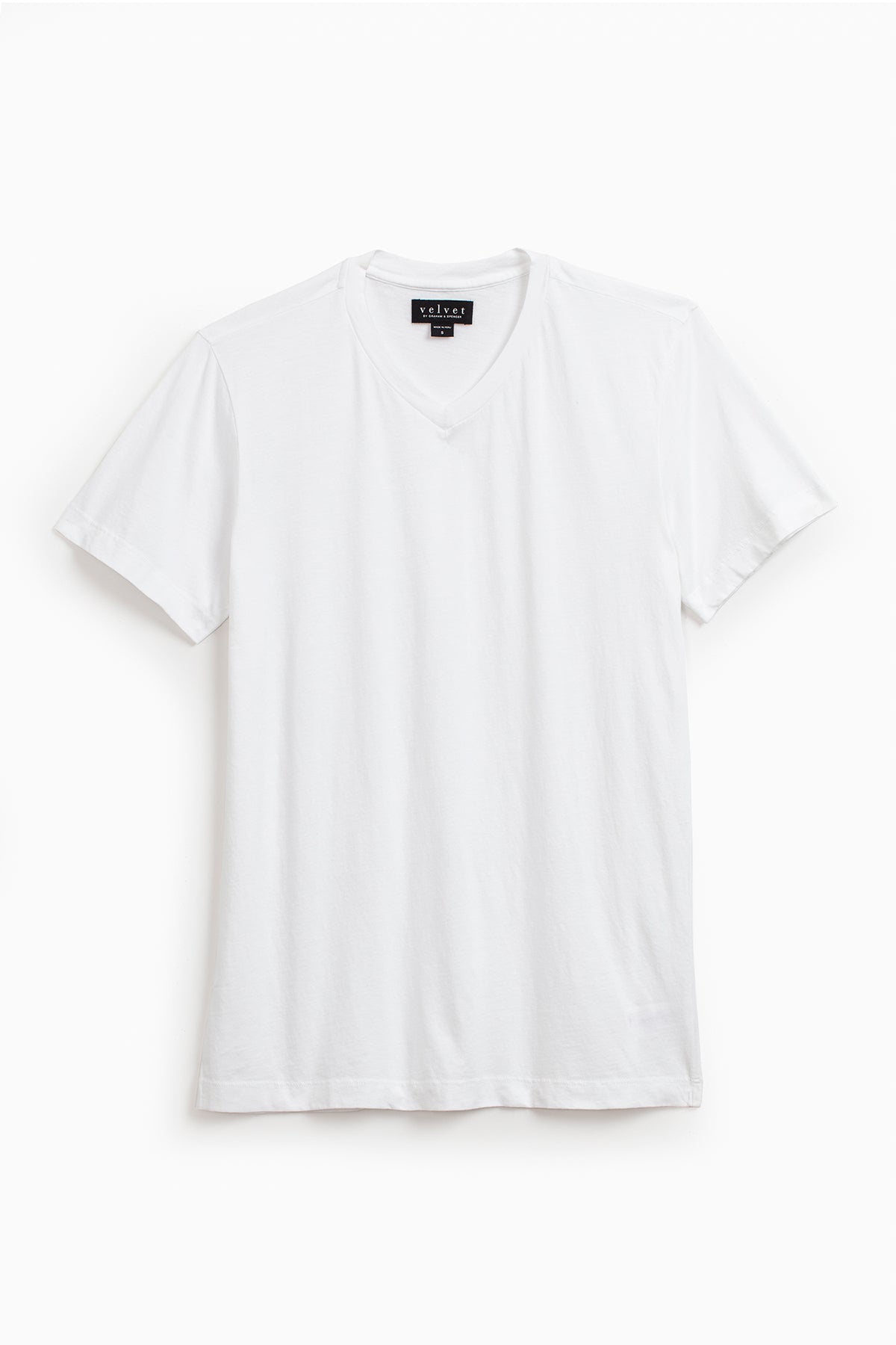   A plain white whisper knit SAMSEN TEE by Velvet by Graham & Spencer with short sleeves is displayed against a white background, offering a flawless fit. 