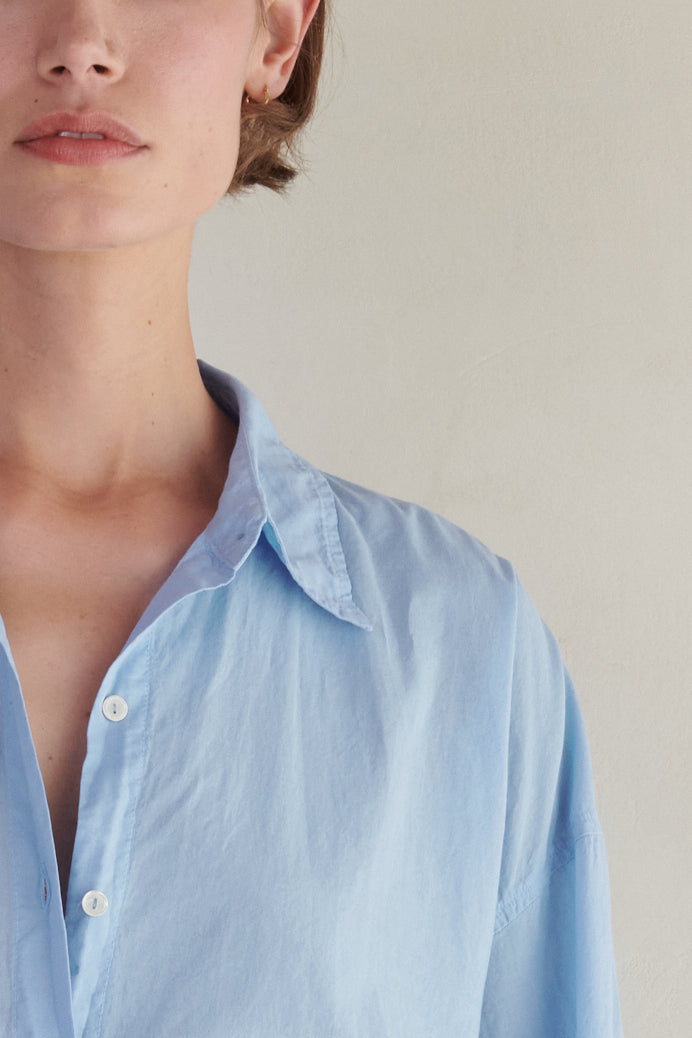   a woman wearing a Velvet by Jenny Graham REDONDO BUTTON-UP SHIRT. 