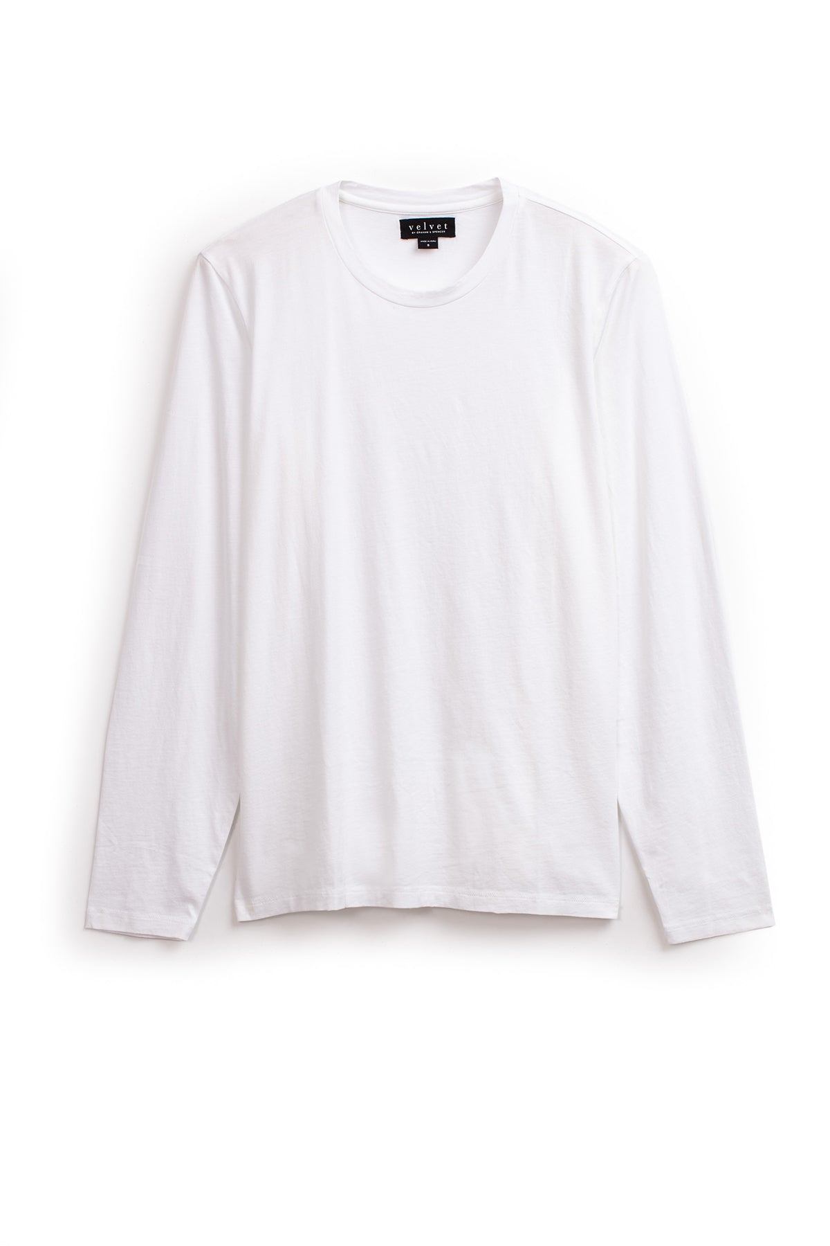   A plain white long-sleeve T-shirt, the Velvet by Graham & Spencer SKEETER TEE, is shown against a white background. Made from whisper cotton knit, it features a simple crew neck design and a visible tag inside the neckline. This versatile wardrobe addition is perfect for any casual outfit. 